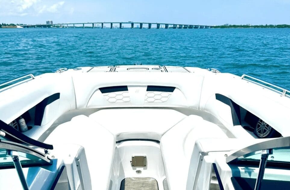 Boat deck with ocean and bridge view.